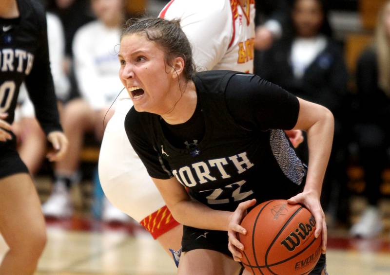 St. Charles North’s Katrina Stack maintains possession of the ball during a game at Batavia on Thursday, Jan. 12, 2023.