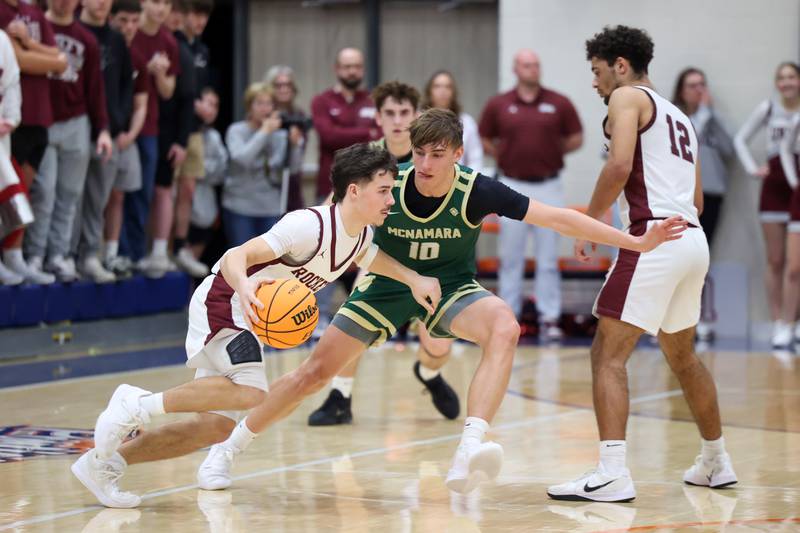 Bishop McNamara's Coen Demack defends the ball during the Fightin' Irish's 77-70 loss to Tolono Unity in the IHSA Class 2A Pontiac Supersectional on Monday, March 9, 2026.