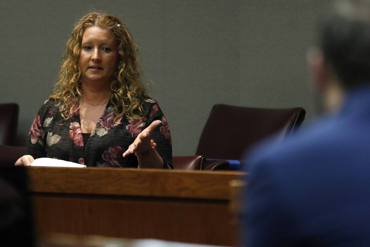 Bethany Austin gives testimony under oath in court with defense attorneys Igor Bozic and Wayne Giampietro inside Judge Michael Coppedge's courtroom at the Michael J. Sullivan Judicial Center on Friday, April 23, 2021, in Woodstock.