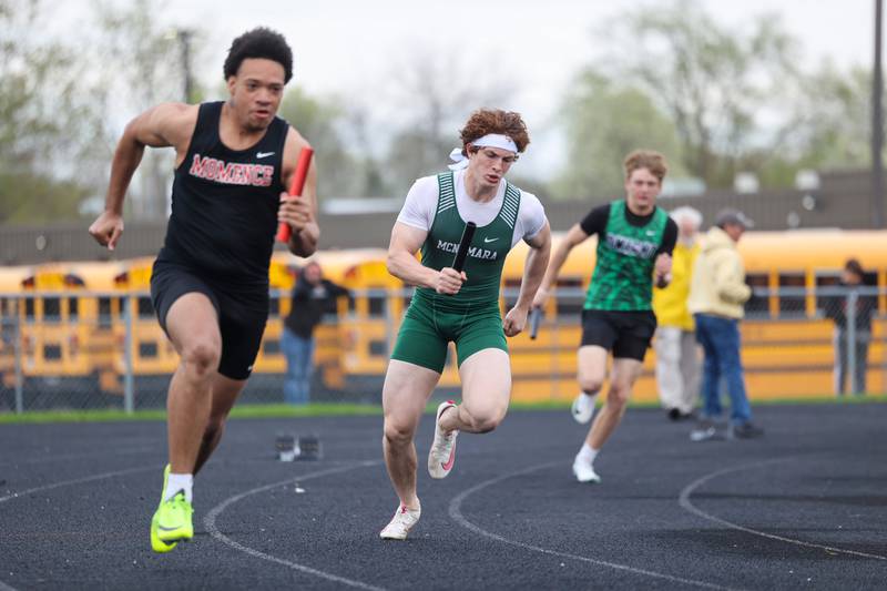 Bishop McNamara's Rhys Landmann, center, accelerates out of the blocks in the boys 100-meter relay at the Manteno Invite on Friday, April 25, 2025.