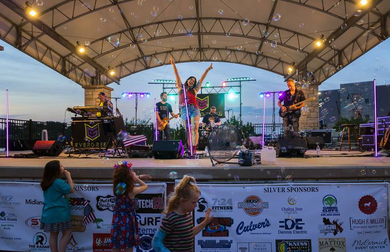 Evergreen rocks the park Thursday, July 3, 2025, in Rock Falls with their brand of 90’s, country and alternative music for Rock Falls Tourism’s 4th of July celebration.