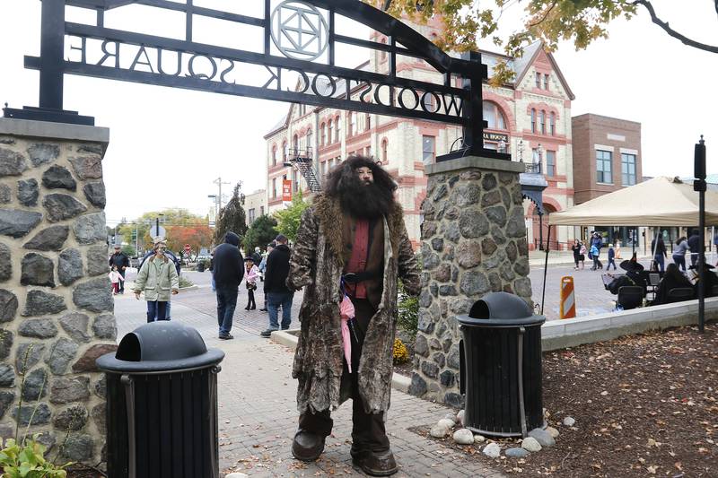 Todd Vandiver, of Janesville, Wi, walks through the historic Woodstock Square dressed as Rubeus Hagrid during the Witches and Wizards event on Sunday, Oct. 24, 2021 in Woodstock.