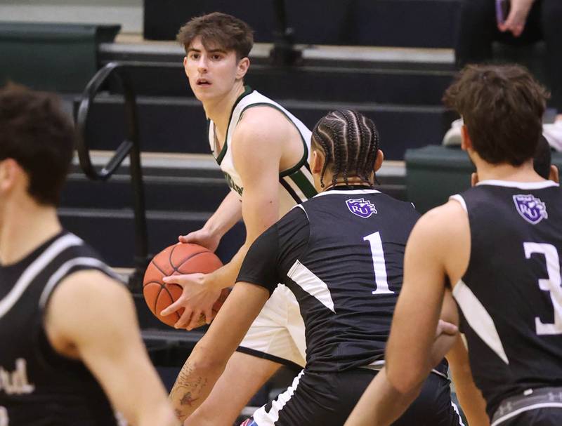 Kishwaukee College's Ben Larry looks to pass Thursday, Jan. 22, 2026, during their game against the Rockford University JV team at Kishwaukee College in Malta.