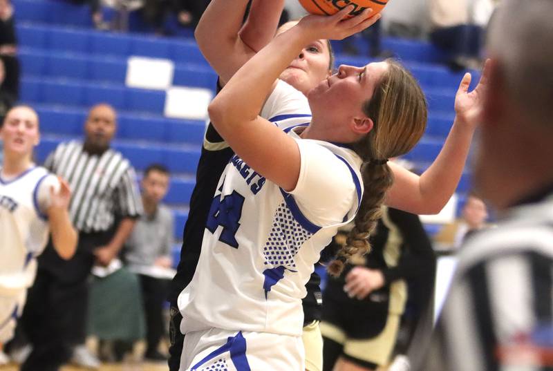 Burlington Central’s Ali Kowal works under the hoop against Sycamore in girls basketball at Burlington Central High School in Burlington on Tuesday, November 18, 2025.