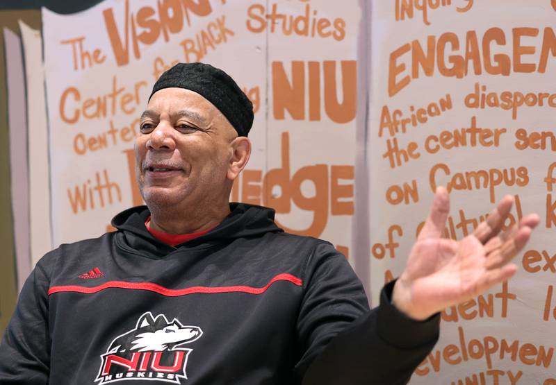 Derrick Smith, an academic counselor in the Center for Black Studies at Northern Illinois University and father of four, talks Tuesday, June 13, 2023, at the center, about what fatherhood has meant to him, how his own father helped change his life and how he feels like a father to the many students he mentors on campus at NIU.