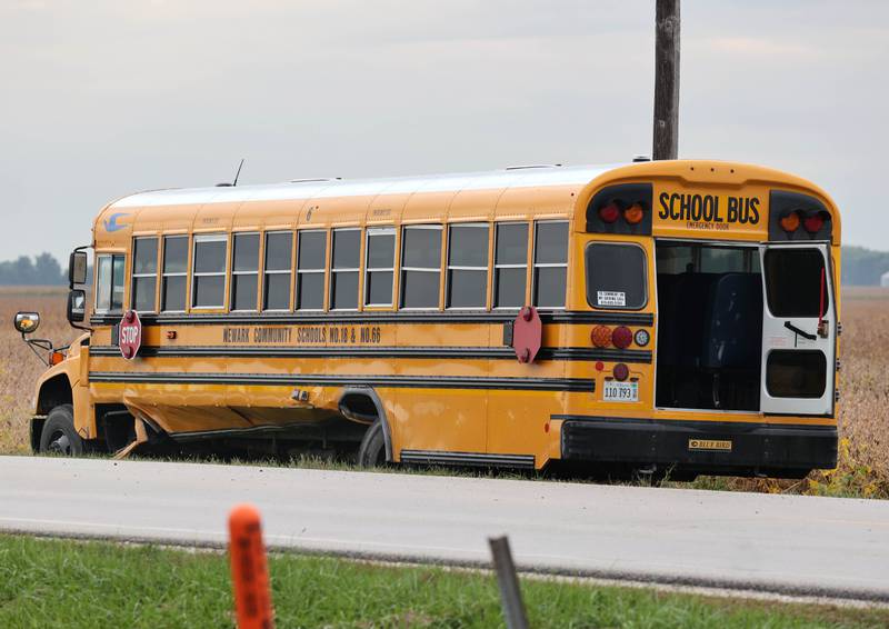 A Newark school bus sits near the intersection of N4750th Road and Millington Road Thursday, Sept. 21, 2023, after being involved in a crash with two other vehicles near Sandwich in Kendall County.