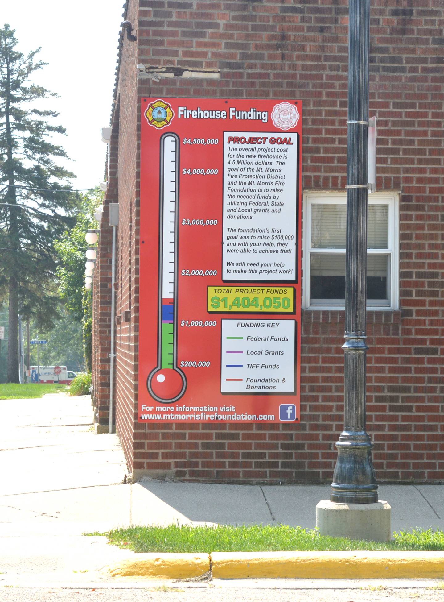 The Mt. Morris Fire Protection District has announced the location of its new fire station. The site is located two blocks north of the existing station. The district has been conducting a fundraising drive for the project. This sign is located on the existing fire station, at S. McKendrie Avenue and Center Street.