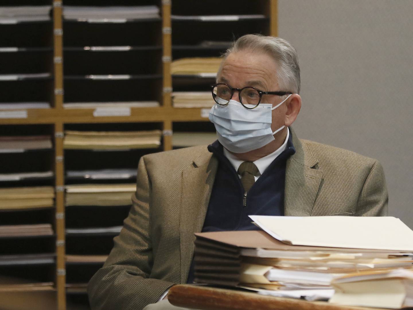 Michael M. Penkava listens to court proceedings Friday, March 11, 2022, during the second day of Penkava and Colin B. Scott’s trial before Judge Mark Gerhardt at the McHenry County Michael J. Sullivan Judicial Center in Woodstock. Penkava and Scott are both elders in a Crystal Lake Jehovah's Witnesses congregation and are charged with misdemeanor failure to report the sexual abuse of a child.