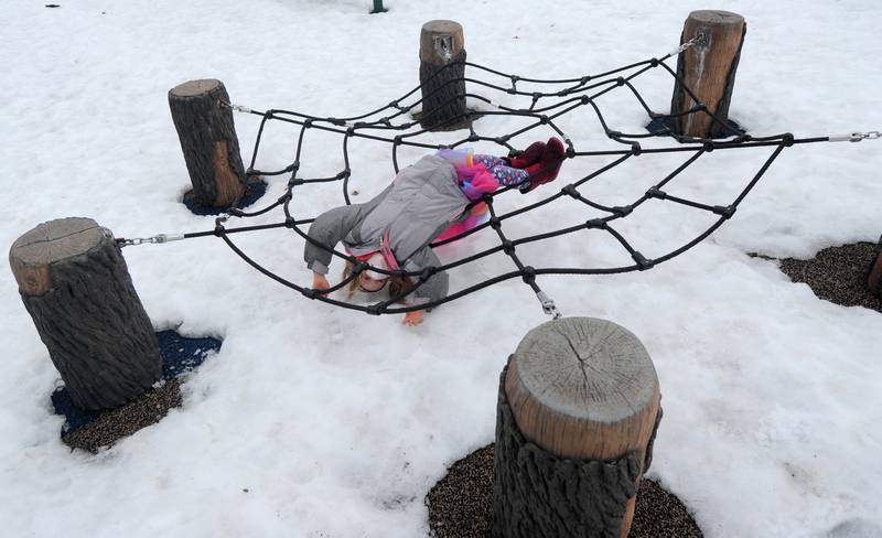 Raisa Jesky, 6, plays at Veterans Acres Park Sunday afternoon, Feb. 28, 2021, in Crystal Lake as people enjoy a bit of warmer weather do doe some outside activities.