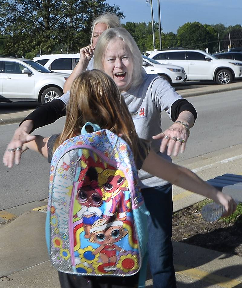 Hugs were given by Centennial School staff Wednesday, Aug. 16, 2023, as students returned for the first day of school in Streator.