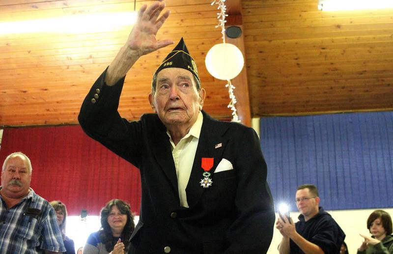 Sandwich resident and World War II veteran Enoch "Nick" Scull, thanked the military community, communities of Plano and Sandwich, and his family and friends, for supporting him as he was awarded the French Legion of Honor medal Oct. 24.