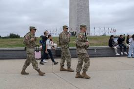 National Guard vehicle collides with civilian car near US Capitol, trapping one person