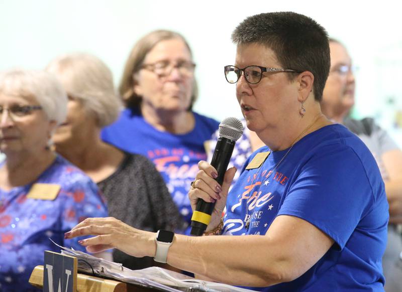 Illinois Valley Quilts of Valor group leader Terry Johnson,  speaks during the Quilt of Valor Tribute to Veterans ceremony on Wednesday, Aug. 20, 2025 at the Bureau County Fair in Princeton.