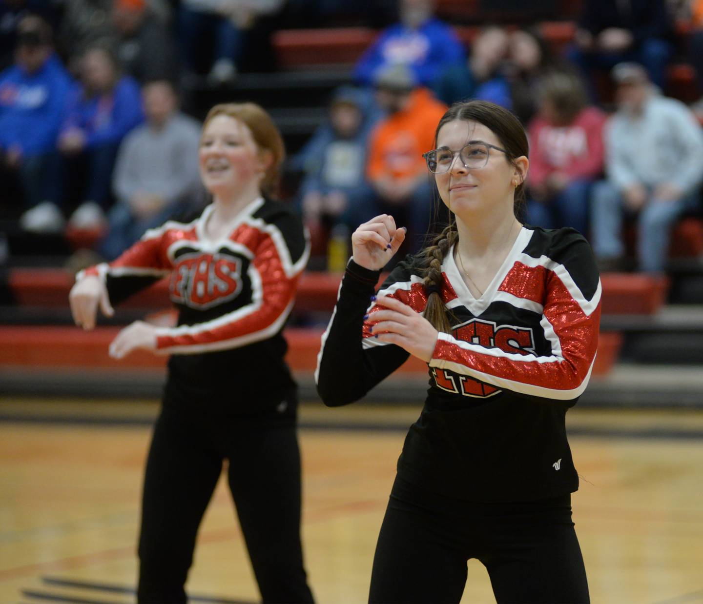 Kaylynn Schliesher (right) and Chloe Lerch, members of Forreston High School's dance team, perform during halftime of the boys varsity basketball game on Saturday, Jan. 4, 2025 at Forreston High School.