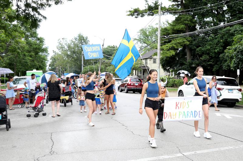 Participants march west on Campbell Street for the annual Swedish Days Kids’ Day Parade on Friday, June 20, 2025 in Geneva.