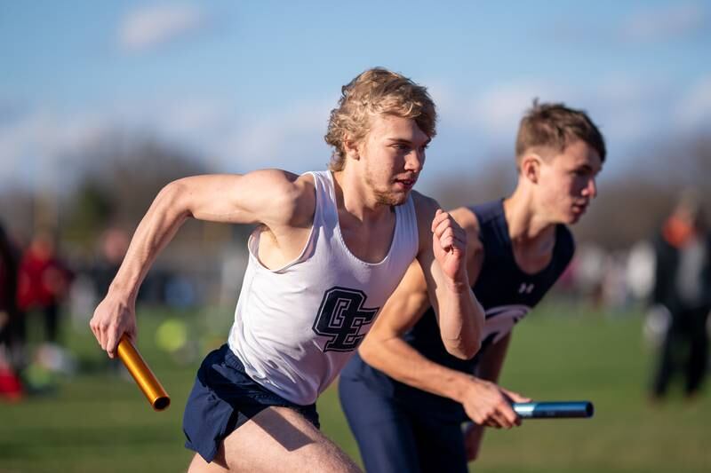 Oswego East’s Jacob Lanzara competes in the 4 x 800 meter relay race during the Matt Wulf Invitational track and field meet at Yorkville High School on Thursday, April 14, 2022.