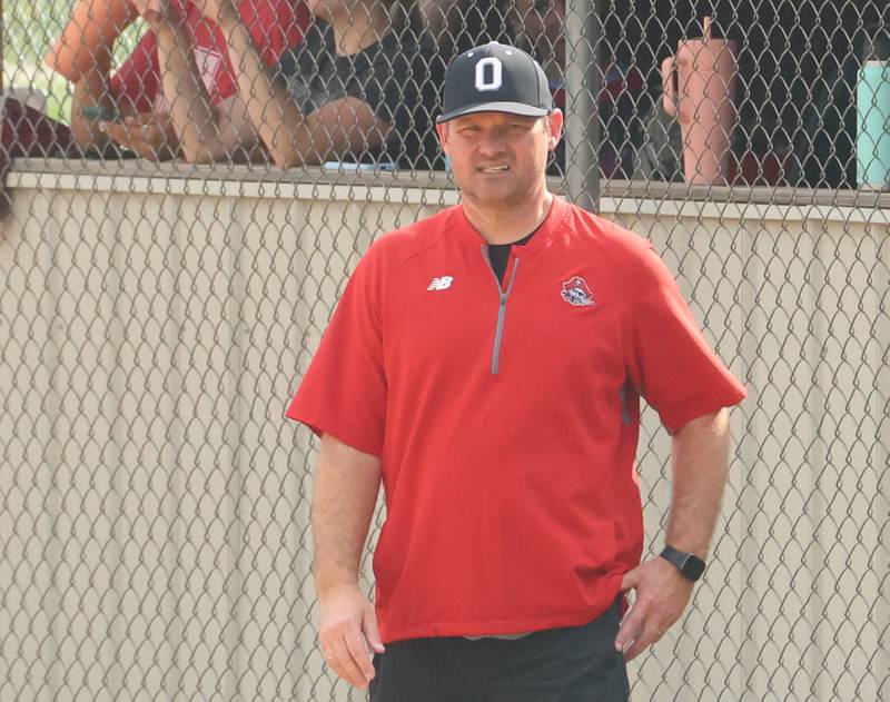 Ottawa head softball coach Adam Lewis manages his team against L-P on Tuesday, April 14, 2026 at Ottawa High School.