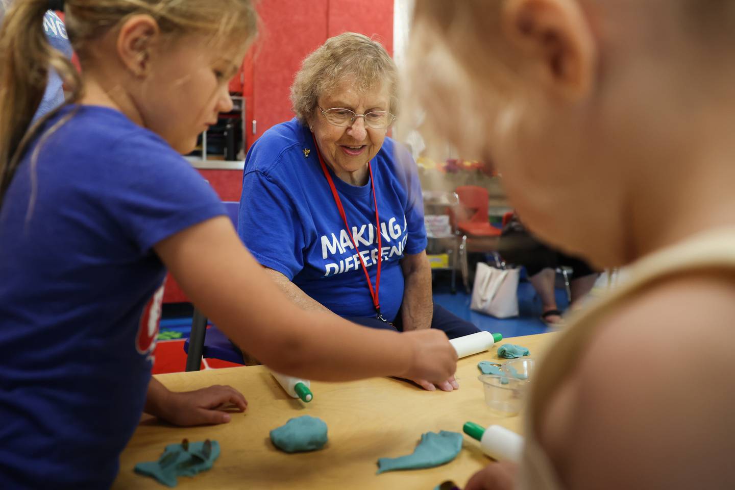 Volunteer Shirley Anderson helps with the Playdough activity at the C.W. Avery YMCA summer camp in Plainfield. Wednesday, July 20, 2022 in Plainfield.