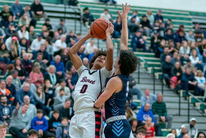 Benet’s Brayden Fagbemi (0) shoots the ball in the post against Lake Park's Adrian Notardonato (3) during a Bartlett 4A Sectional semifinal boys basketball game at Bartlett High School on Tuesday, Feb 28, 2023.