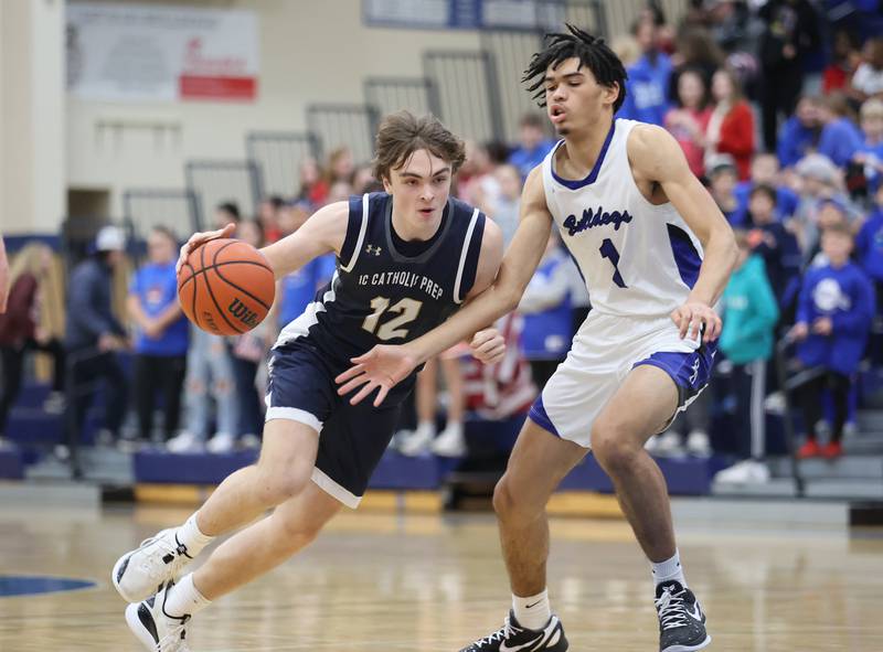 ICCP's Jake Gallagher (12) drives to the basket during the boys varsity basketball game between IC Catholic Prep and Riverside Brookfield in Riverside on Tuesday, Jan. 24, 2023.