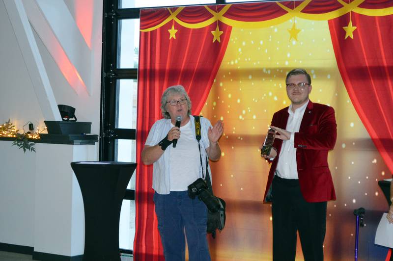 Oregon Area Chamber of Commerce Citizen of the Year Earleen Hinton (left) speaks after being named while Chamber Executive Director Chance Munroe holds her award on Thursday, Aug. 15, 2024, at River's Edge Experience in Oregon.