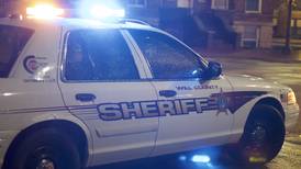 Lockport Township residence struck by gunfire with three people inside