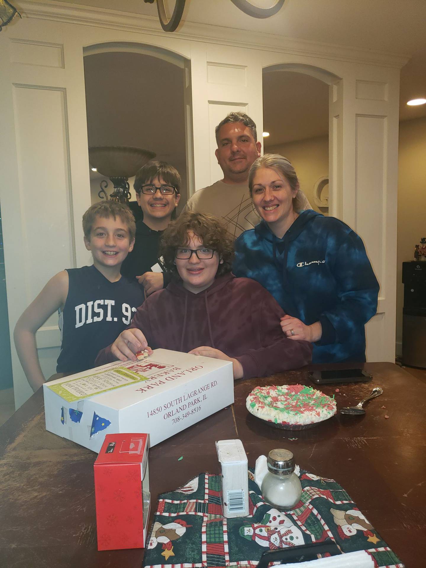 Vinnie Gincauskas, 15, of Lockport (seated, center) has a rare soft tissue cancer called desmoplastic small round cell tumors or DSRCT. The cancer is aggressive but so is his treatment. He is pictured with his parents Nick and Mary Ellen Gincauskas and his brothers (from left) Dominic and Joseph.