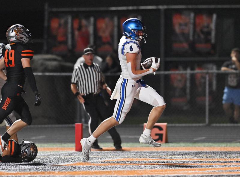 St. Charles North's Keaton Reinke (6) scores a touchdown during the non-conference game against Minooka on Friday, August. 29, 2025, at Minooka.