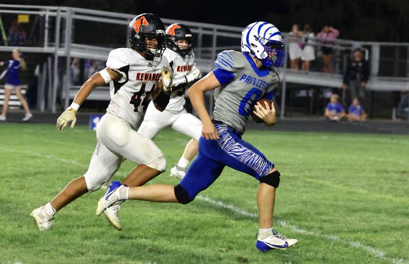 Princeton Kaleb Conwell races for a run in the TIgers' 63-12 win over Kewanee on Friday.