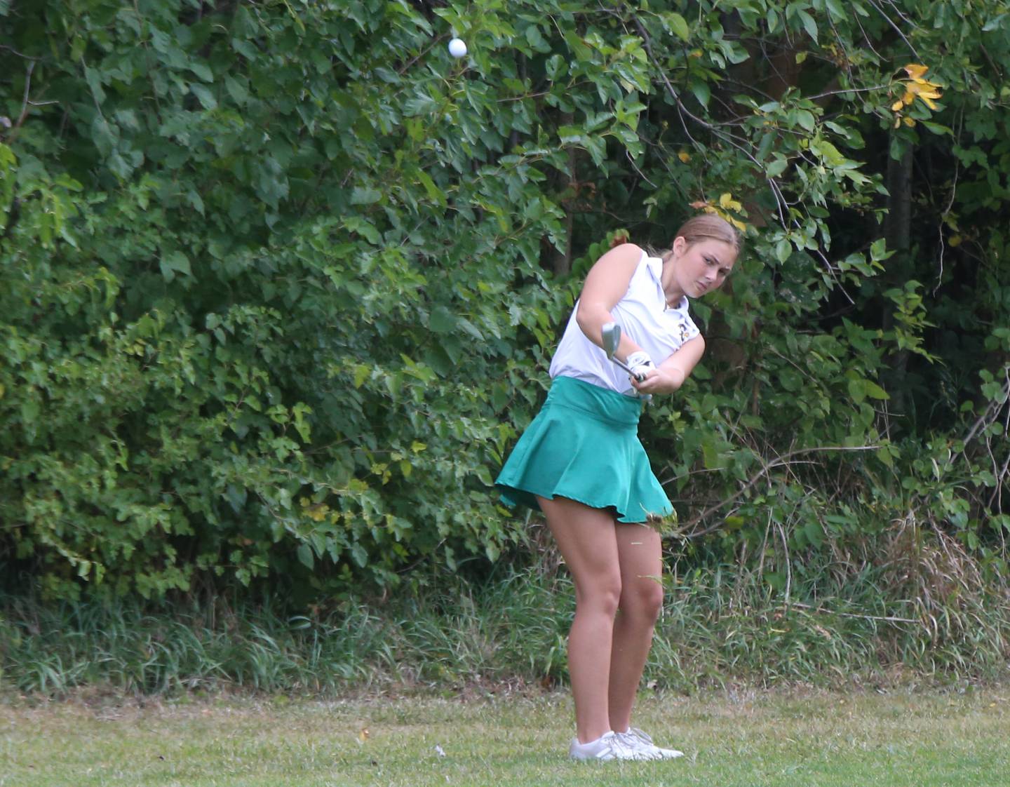 Coal City's Kylee Kennell hits onto the green during the Illinois Central Eight Conference Golf Meet on Monday, Sept. 18, 2023 at Wolf Creek Golf Course in Pontiac.