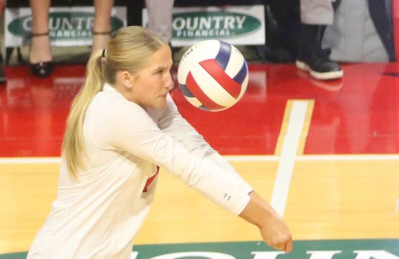 Benet Academy's Morgan Asleson returns a serve from Huntley during the Class 4A State semifinal game on Friday, Nov. 15, 2024 at CEFCU Arena in Normal.