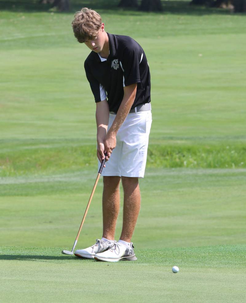 Kaneland’s Brian Davoust putts on the ninth green during the Mark Rolfing Cup Monday, Aug. 21, 2023, at the Kishwaukee Country Club in DeKalb.