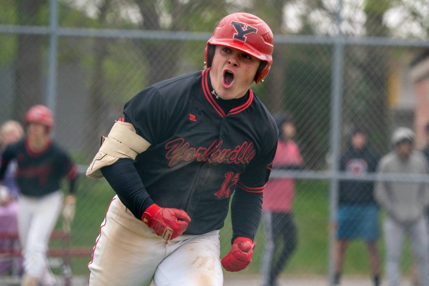 Yorkville's Kam Yearsley (17) reacts after hitting a single against Oswego East during a baseball game at Yorkville High School on Tuesday, May 2, 2023.