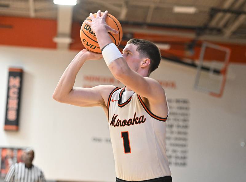 Minooka's Jaden Boe (1) shoots a jump shot during a conference game against Joliet Central on Friday, Jan. 10, 2025, at Minooka.