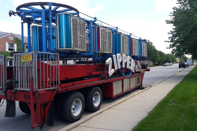 Carnival rides from Midway by A & A Attractions line the perimeter of City Park in Streator on Monday, May 23, 2022, ahead of the weekend's three-day Park Fest, featuring a carnival, live music and craft vendors, among other activities.