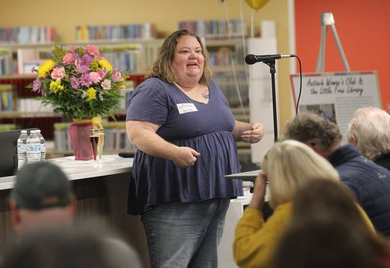 Becky Masik, of Antioch, Renovation & Expansion Committee chair, addresses patrons Saturday, May 13, 2023, during the Antioch Public Library District Open House Ceremony in Antioch.