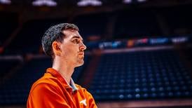 Men’s college basketball: Rock Falls native loves playing part for Longhorns