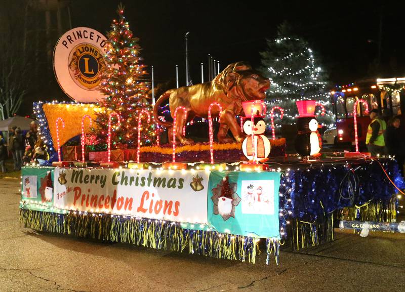 The Princeton Lions Club float drives down Main Street in the inaugural Lighted Christmas Parade on Friday, Dec. 1, 2023 in Princeton.