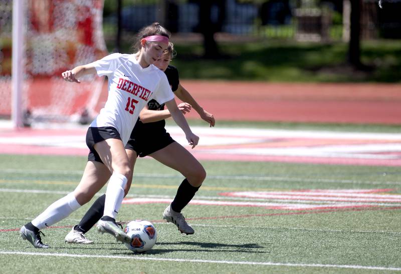 Deerfield’s Holly Deutsch (15) gets control of the ball during an IHSA Class 2A state semifinal game against Benet at North Central College in Naperville on Friday, June 3, 2022.