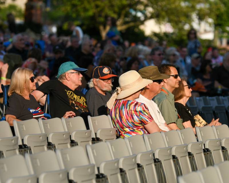 Community members listen to Second Hand News, a Chicago-based Fleetwood Mac tribute band on Friday Aug. 2, 2024, before Rocks Off: A Tribute to The Rolling Stones preform at Memorial Park in Wheaton.