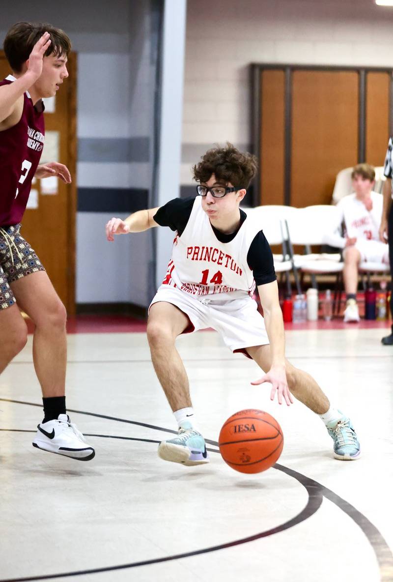 Princeton Christian Academy's Santy Slevin makes his moves in Tuesday's game vs. Ottawa Christian Academy at Howard Hoffman Memorial Gym. The Eagles won 57-42.
