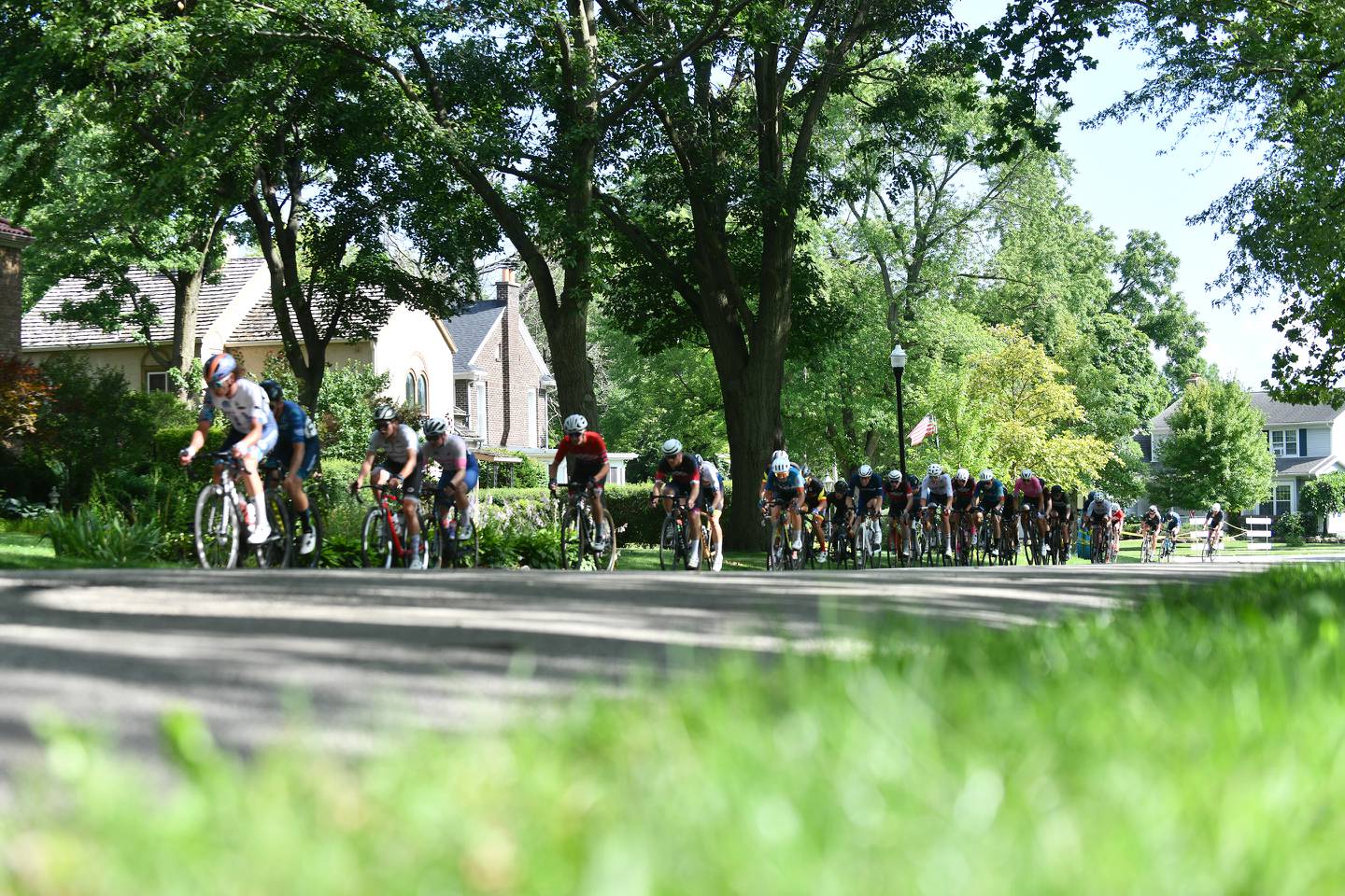 Riders in the pro category speed along the course Sunday afternoon during the 2023 Cobb Park Criterium, the annual bicycle races hosted by the South Chicago Wheelmen since the early 1980s in Kankakee's Cobb Park.