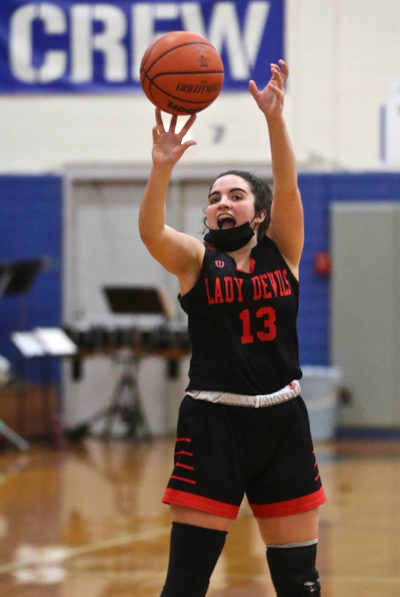 Hall's McKenna Christiansen takes aim Monday night at Princeton.