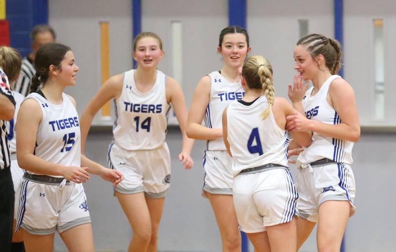 Princeton players (from left) Olivia Mattingly, Payton Brandt, Avaya Koning, Paige Jesse and Keighley Davis react after defeating Hall during the Princeton Holiday Girls Basketball Tournament on Friday, Nov. 23, 2024 at Princeton High School.