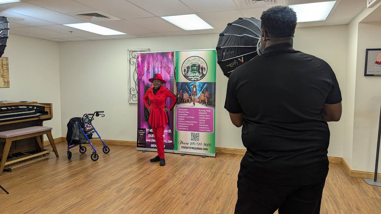 Wayne McNair of Wayne McNair Photography takes photos of Beatrice Taylor, one of the resident models at Joshua Arms Senior Residences of Joliet, during a pre-fashion and talent show photo shoot on Friday, April 18, 2025.