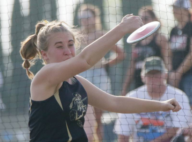 Marquette's Kaitlyn Magoonaugh throws the discus in the Class 1A Bureau Valley Sectional on Wednesday, May 11, 2022, in Manlius.
