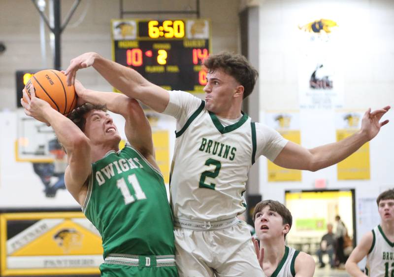 Dwight's Joey Starks eyes the hoop as St. Bede's Guss Burr defends during the Tri-County Conference Tournament on Tuesday, Jan. 27, 2026 at Putnam County High School.