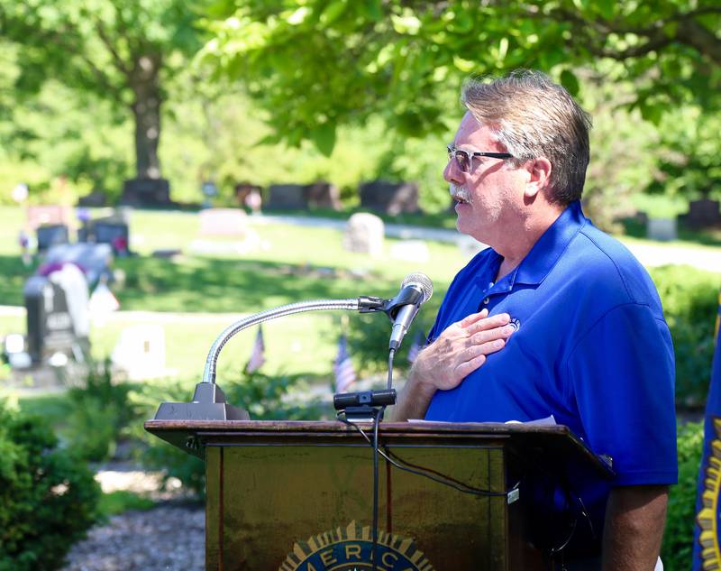 Elburn Village President and veteran, Jeff Walter, leads everyone in the Pledge of Allegiance on Monday, May 29, 2023 in Elburn.