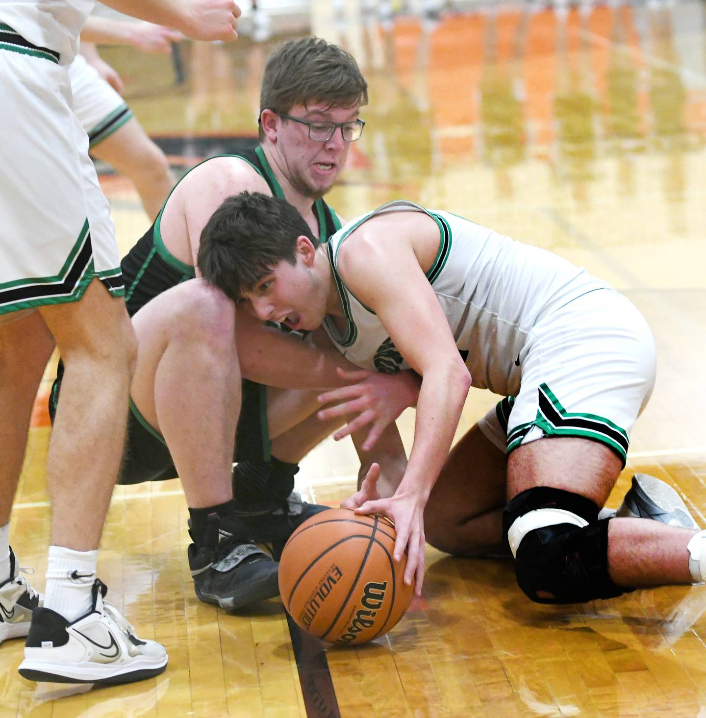 Rock Falls' Chevy Bates and Eureka's Slater Wilcox battle for a loose ball on Thursday at the 2A Byron Regional.