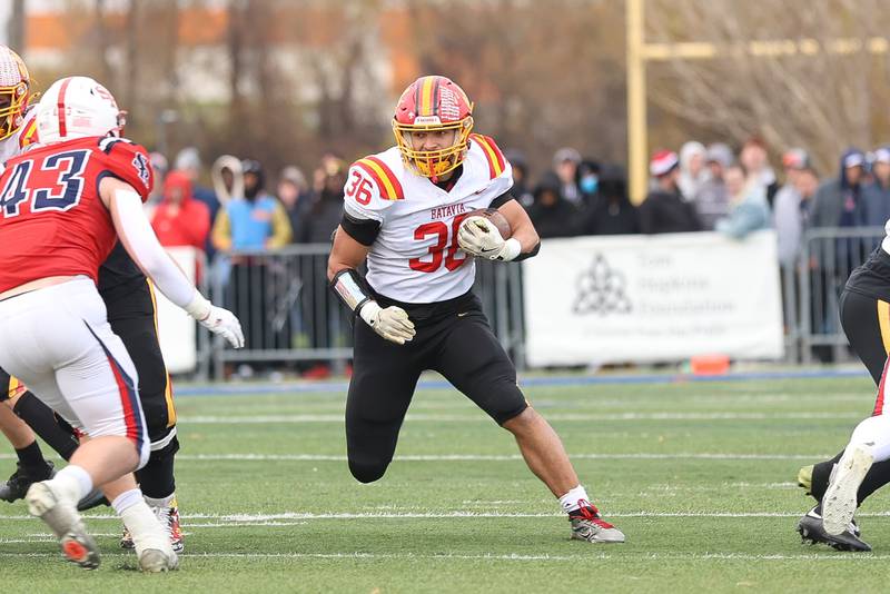 Batavia's Preston Brummel finds a hole on a run against St. Rita in the Class 7A state semifinal on Saturday, Nov. 22, 2025 in Chicago.
